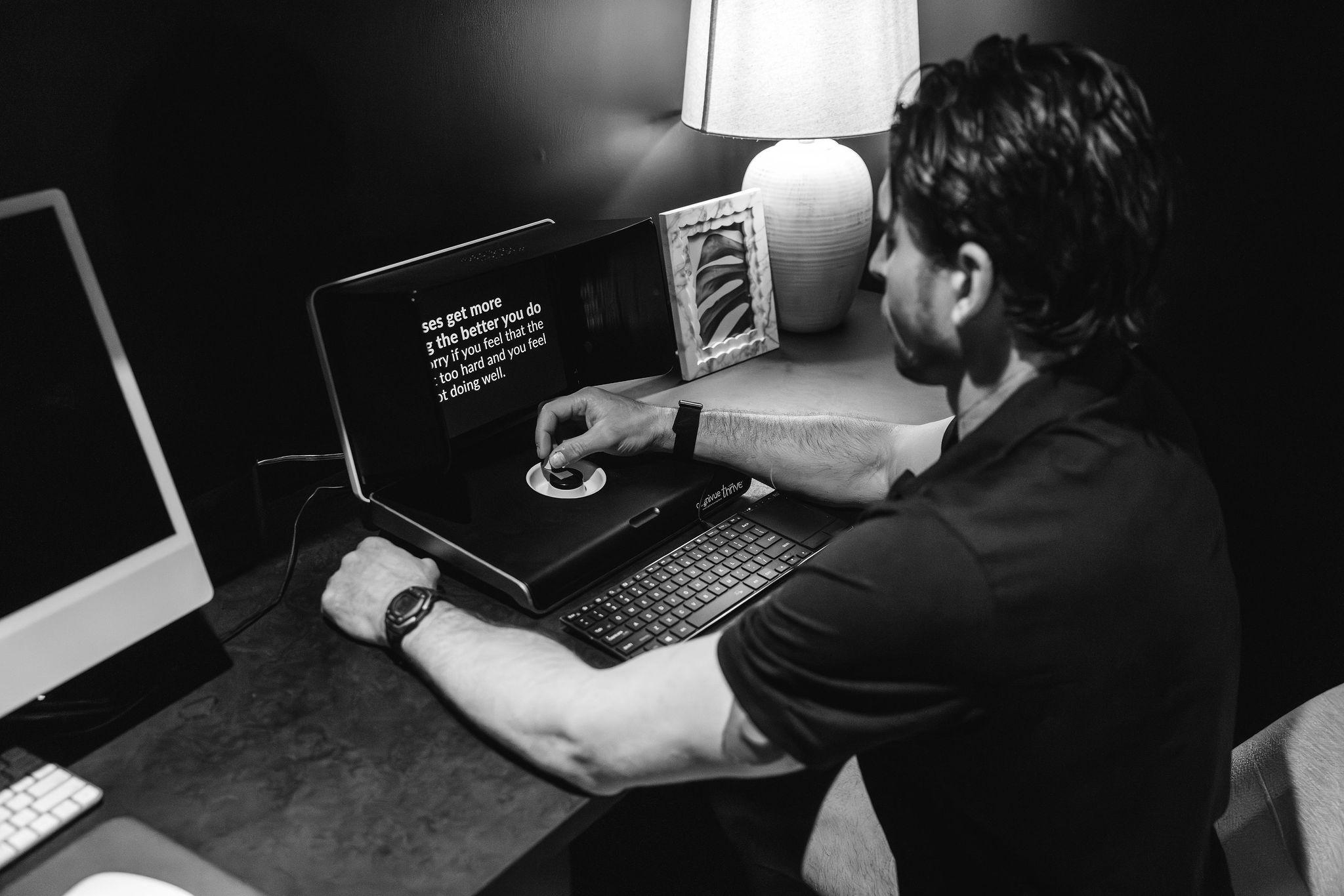 Patient completing the Cognivue Clinical cognitive assessment.